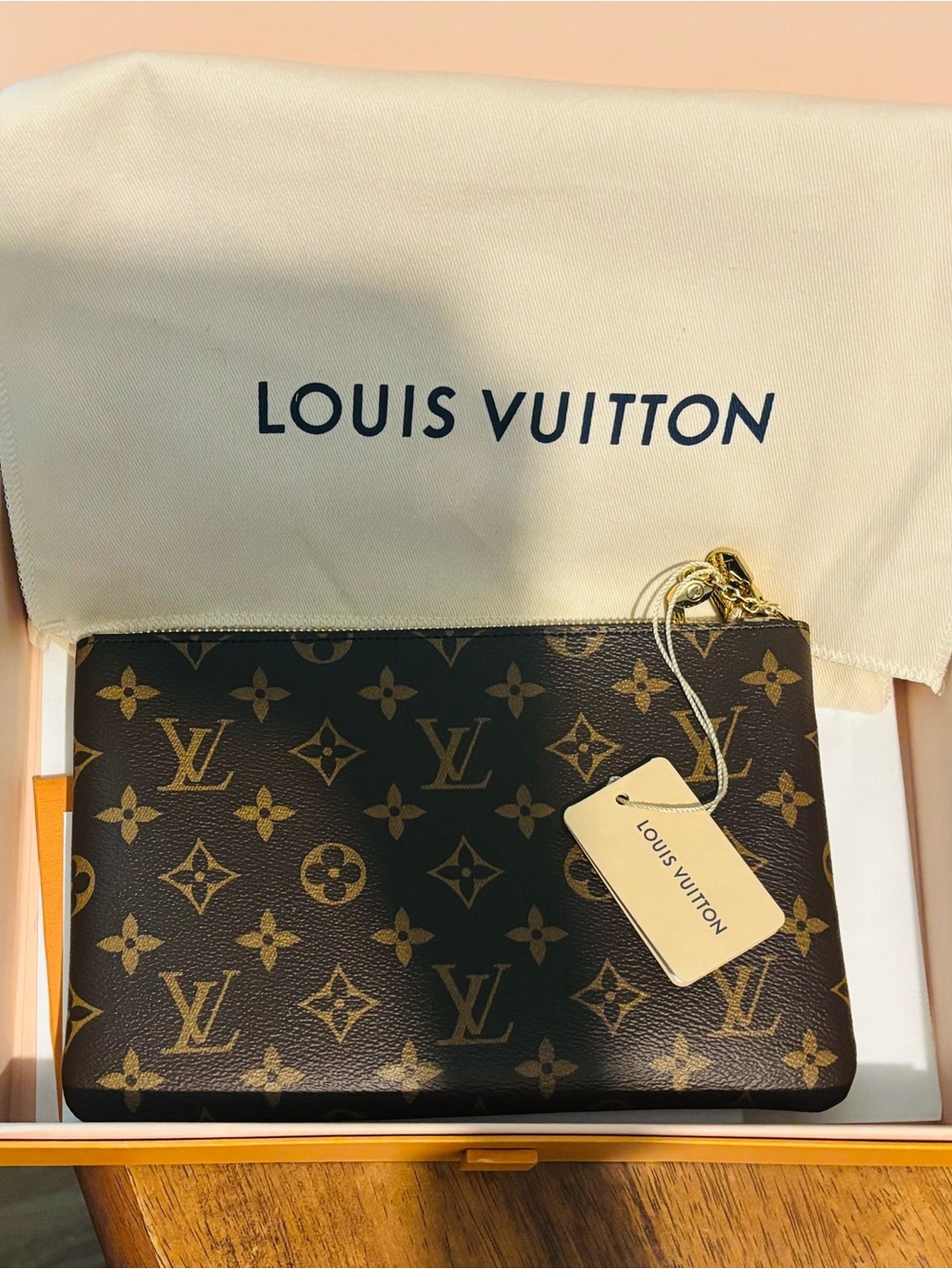 Louis Vuitton Monogram Canvas Wristlet in Brown and Gold